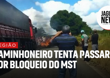 Caminhoneiro perde a paciência e tenta passar por bloqueio, mas é impedido por integrantes do MST